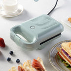 Máquina de hacer sándwiches compacta y antiadherente con una potencia de 650W
